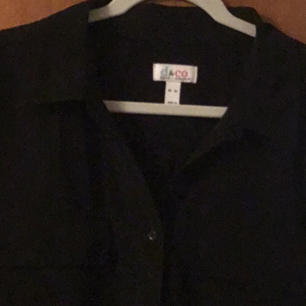 Long sleeve black shirt.